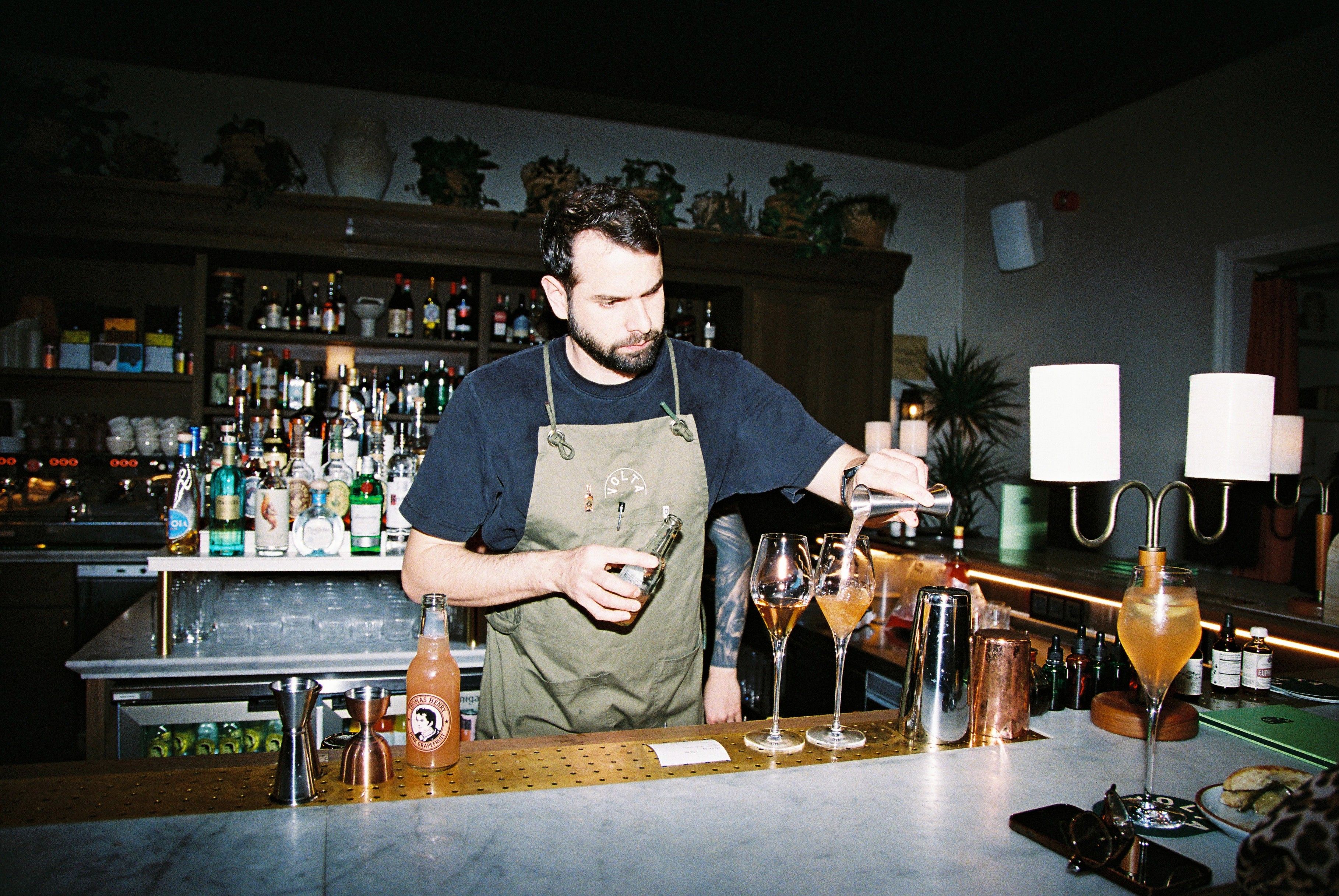 Volta bartender crafting cocktails